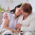 happy elderly mother chatting with her smiling middle aged daughter positive impact of social e1700025877677