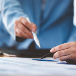 team work with business analytic price chart on the table at the conference room  e1700018001436