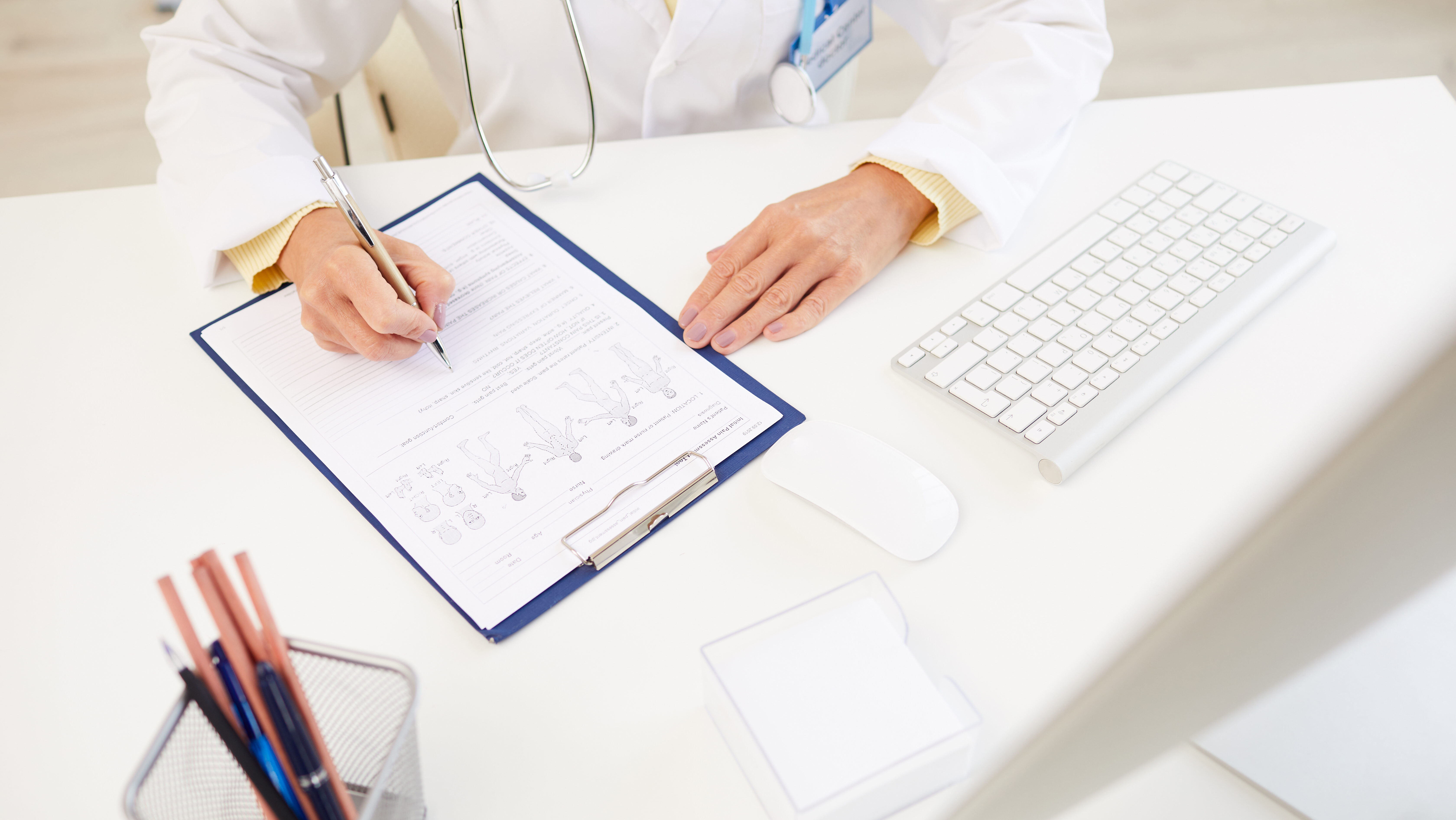 writing down symptoms of patient e1699547862490